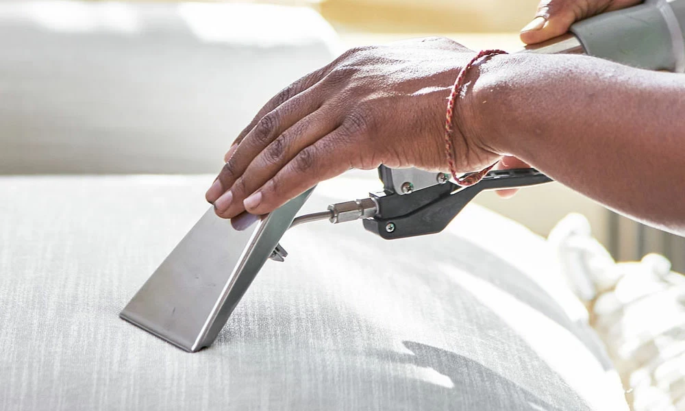 Why should new parents prioritise upholstery cleaning now?